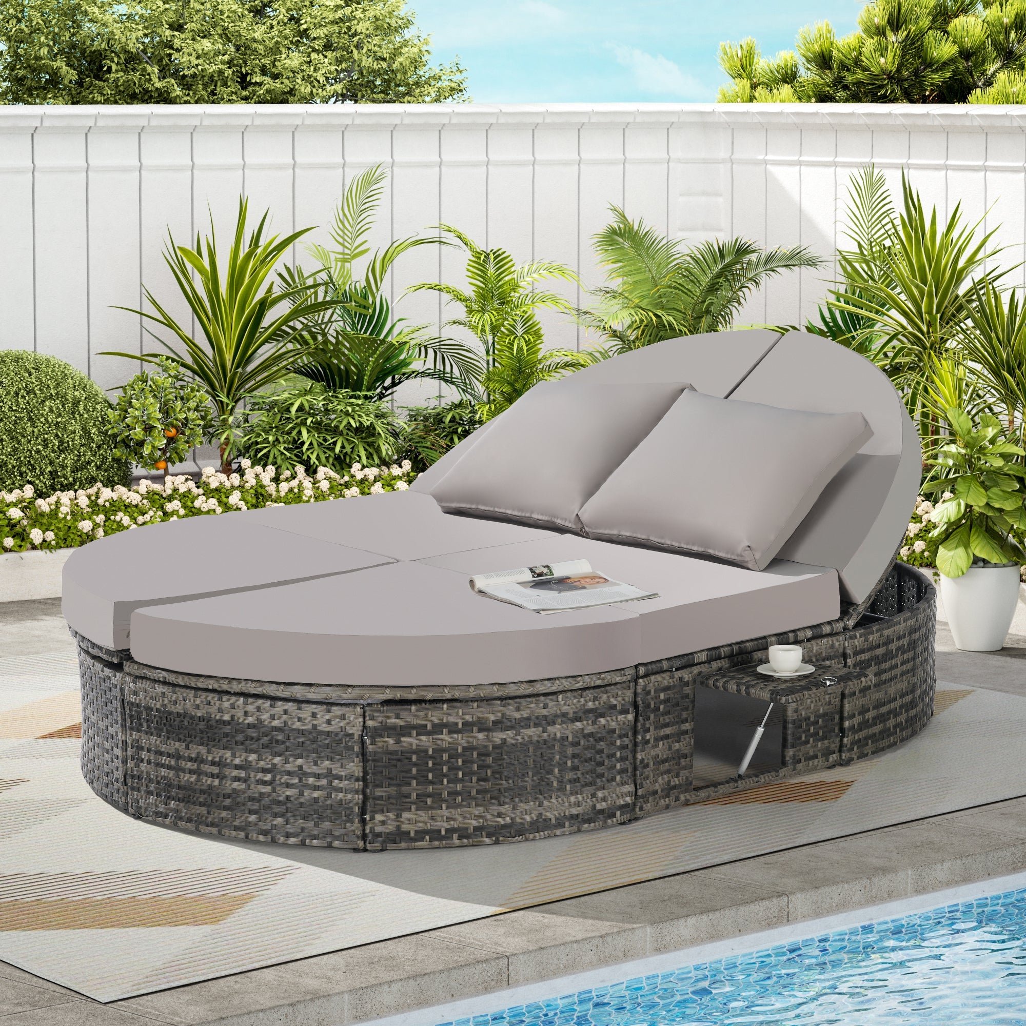 Round outdoor patio daybed with adjustable backrests foldable cup trays and cushioned wicker design ideal for backyard and poolside lounging